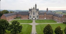 An aerial view of the Scourmont Abbey and its manicured green lawn in Belgium.